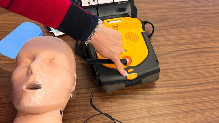 An AED is a lifesaving tool to diagnose and treat sudden cardiac arrest and is simpler to use than many people think. After turning on an AED, the machine guides users through each step, automatically assesses heart rhythm and will only deliver a shock if it is needed.